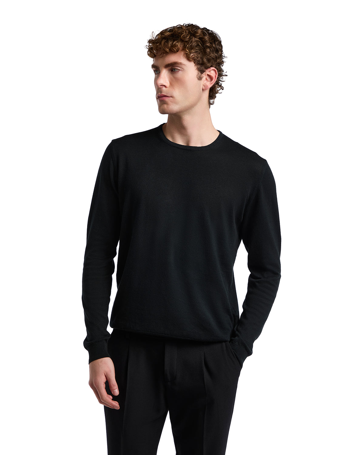 Men's black long-sleeve crewneck shirt, soft cotton blend, casual style, perfect for layering or solo wear.