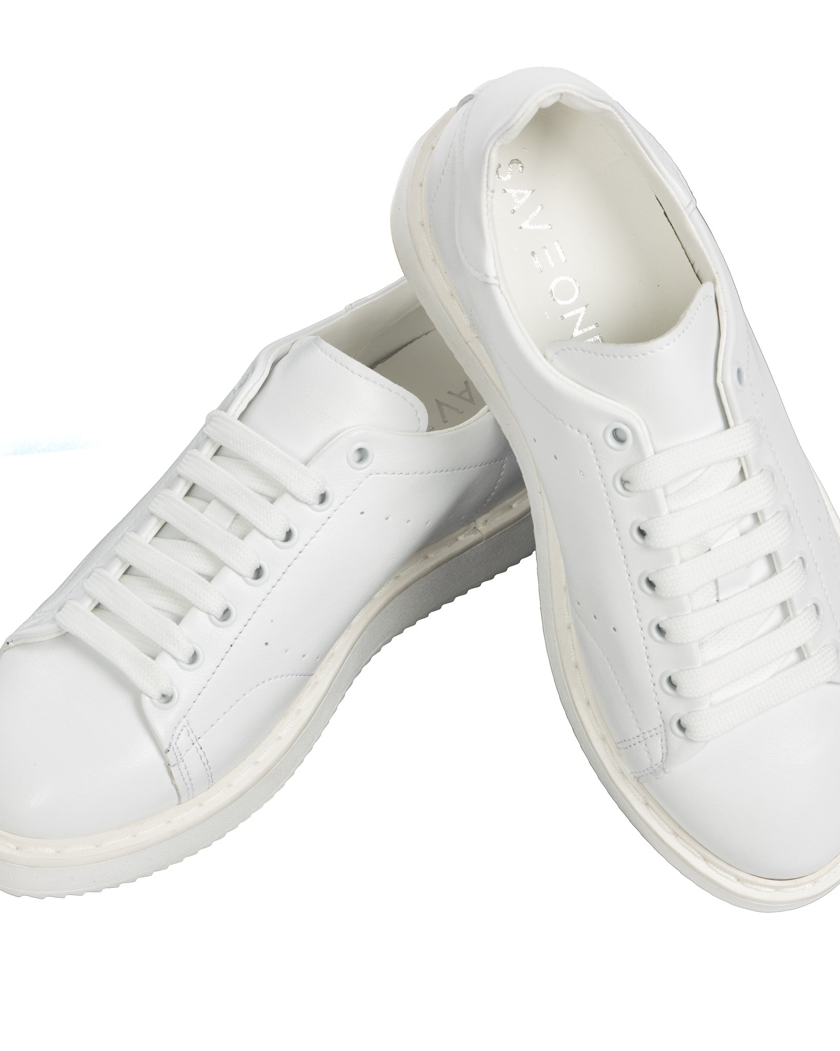 S01 - zapatillas de piel blanca