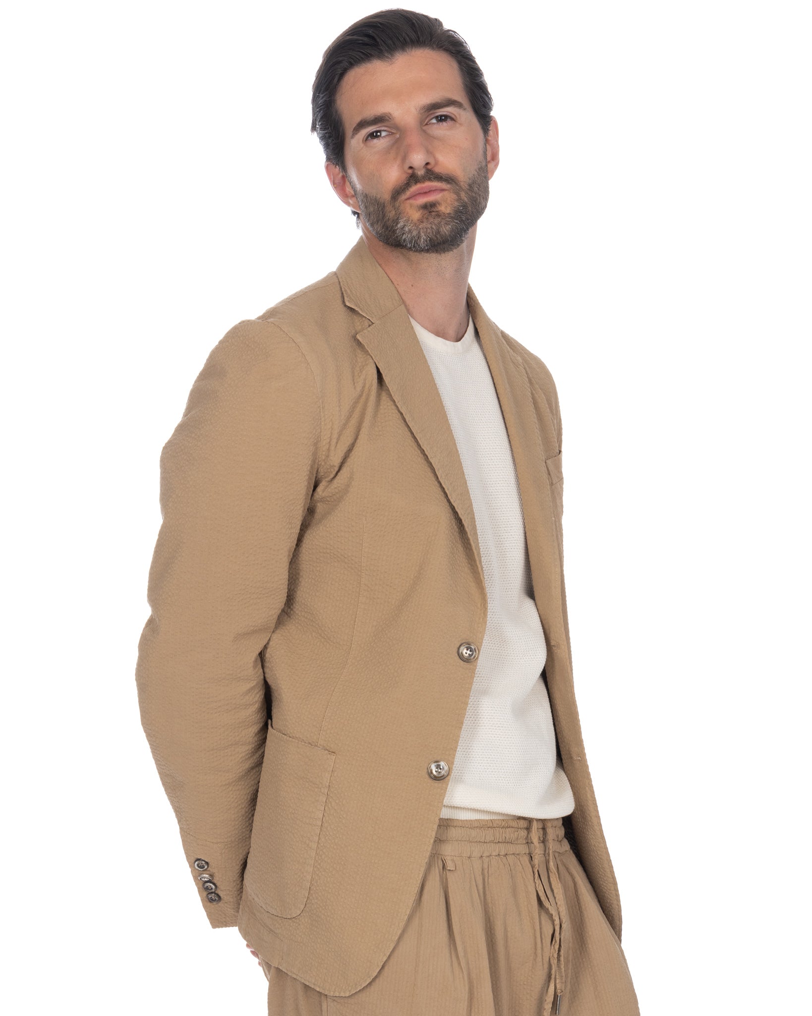 Adro - embossed camel jacket